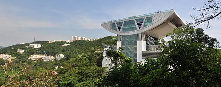 The Peak Tower with its curved roof and observation deck on Victoria Peak, Hong Kong